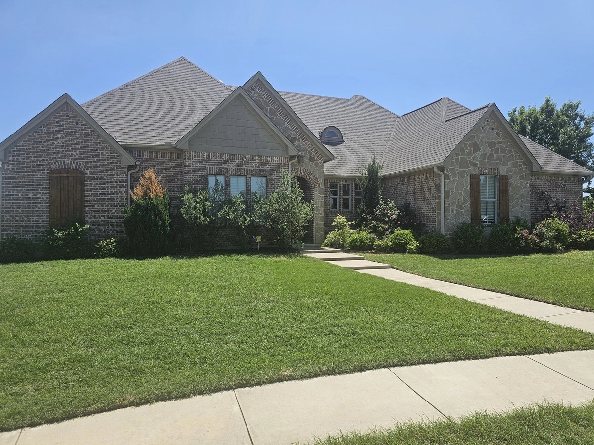 My Roofing crew installing a new roof on a residential home in Johnson County