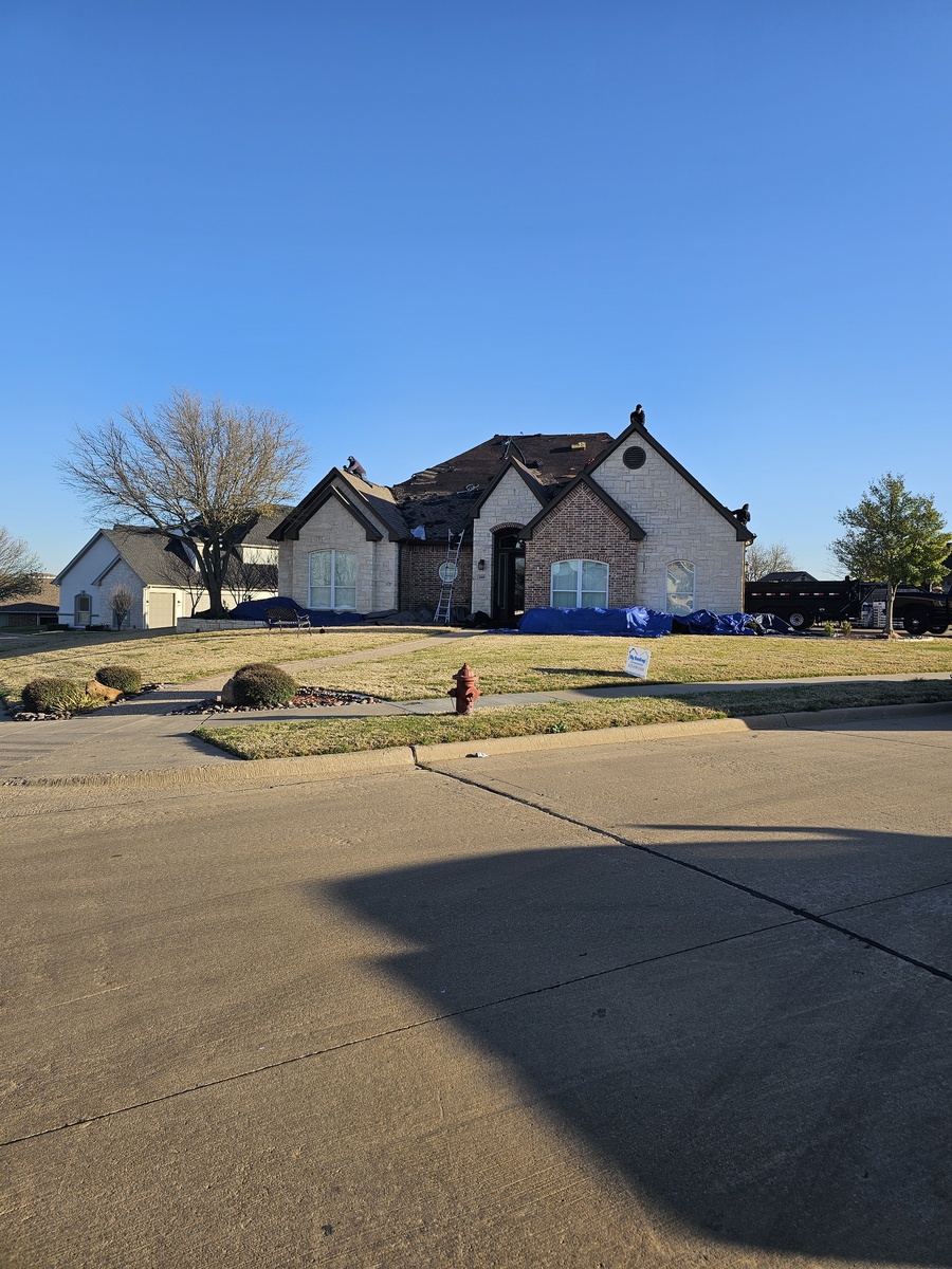 Large tear-off project in progress in Johnson County, TX by My Roofing